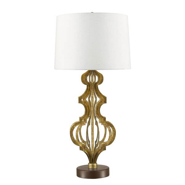 Lampa z białym abażurem i ażurową podstawą do sypialni