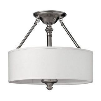 srebrna lampa sufitowa z białym abażurem