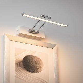 Kinkiet Beam Thirty do oświetlenia obrazu w salonie