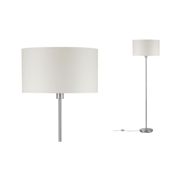 Lampa podłogowa Tessa przy fotelu w salonie