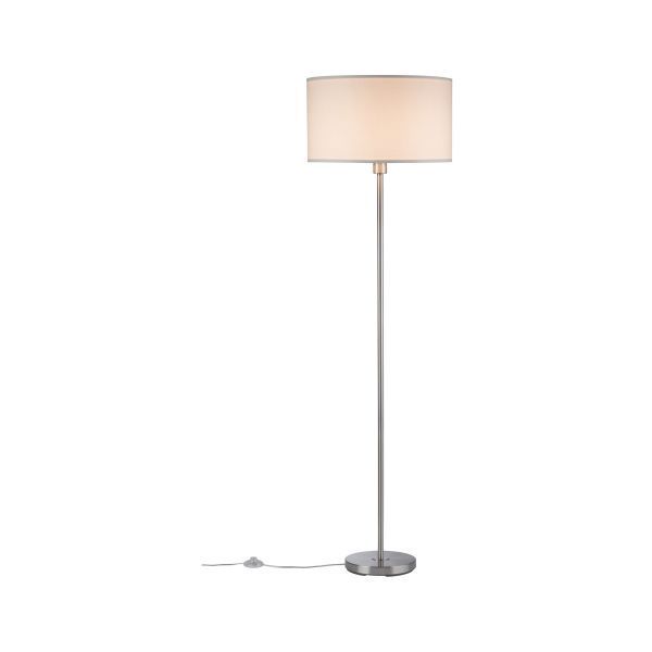 Lampa podłogowa Tessa przy fotelu w salonie