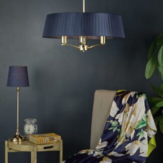 Lampa wisząca Cristin nad fotel w salonie