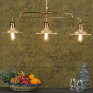 Lampa miedziana z trzema kloszami.