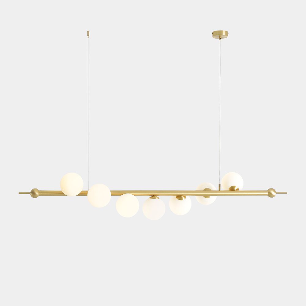 Złota wisząca lampa Wave 7 z kloszami z mlecznego szkła