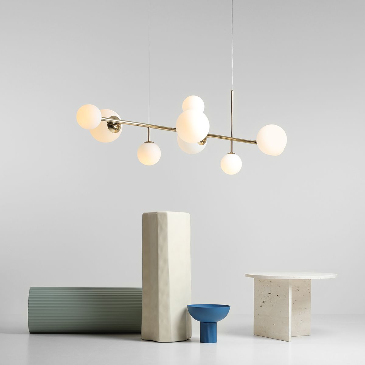 Szeroka, wisząca lampa Dione Gold 9 idealna nad stół