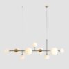 Szeroka, wisząca lampa Dione Gold 9 idealna nad stół
