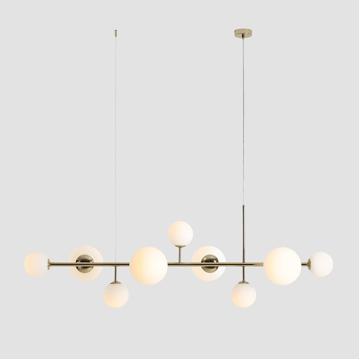 Szeroka, wisząca lampa Dione Gold 9 idealna nad stół