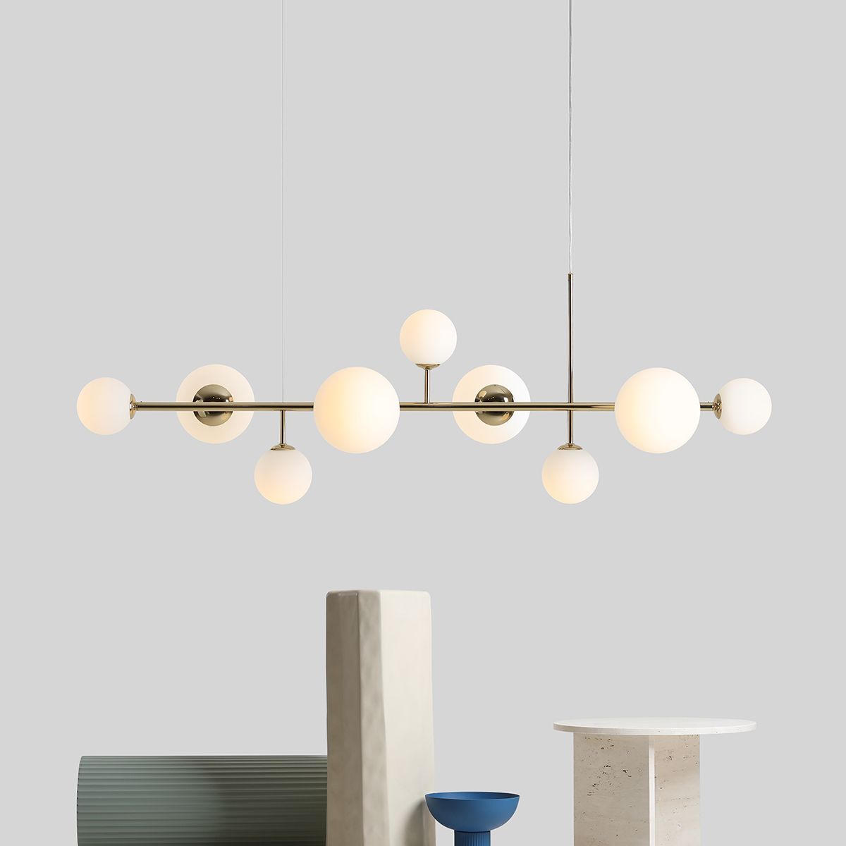 Szeroka, wisząca lampa Dione Gold 9 idealna nad stół