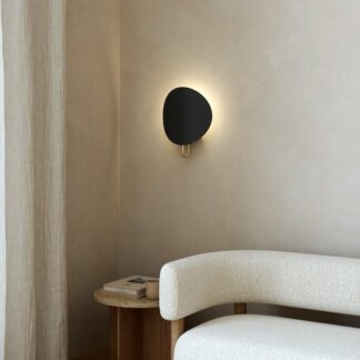 Lampa ścienna Spargo w eleganckim połączeniu czerni i złota