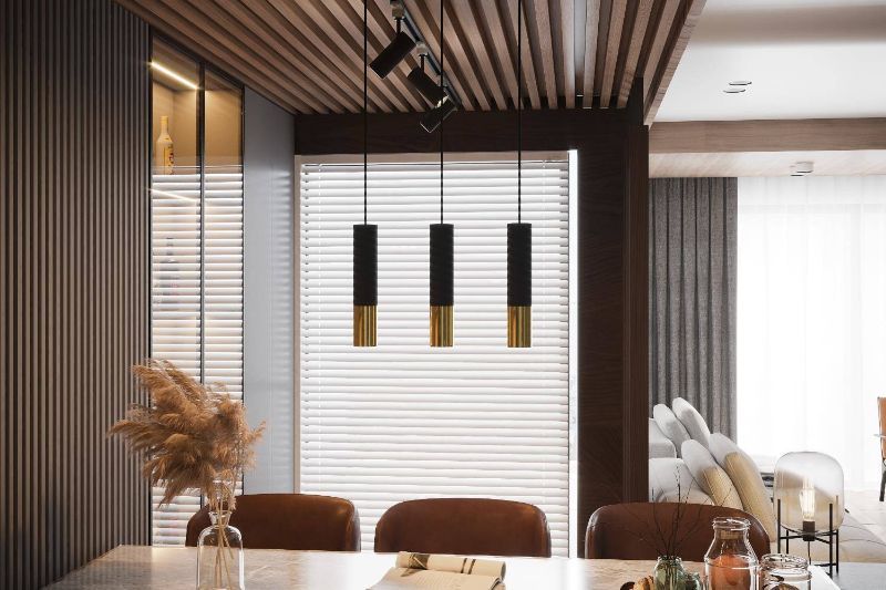 Elegancka wisząca lampa Loopez w złotym wykończeniu