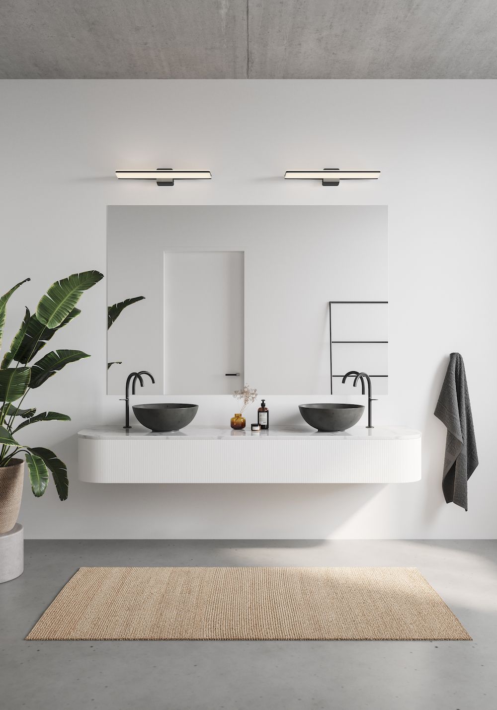 Czarny kinkiet Tinia 60 o klasie szczelności IP44