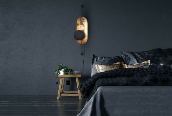 Kinkiet Wheel Lux I w eleganckim połączeniu czerni i złota