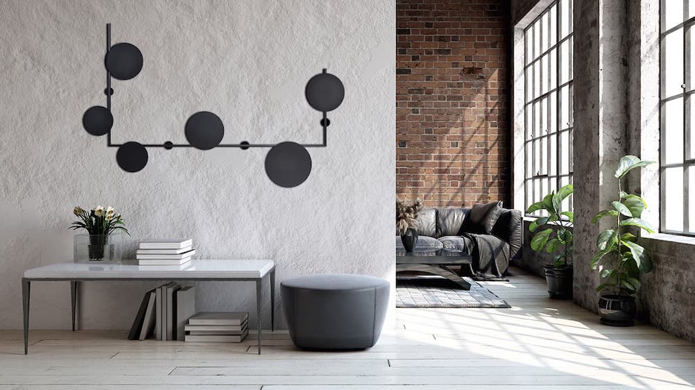 Stylowy kinkiet Rega z trzema czarnymi okręgami