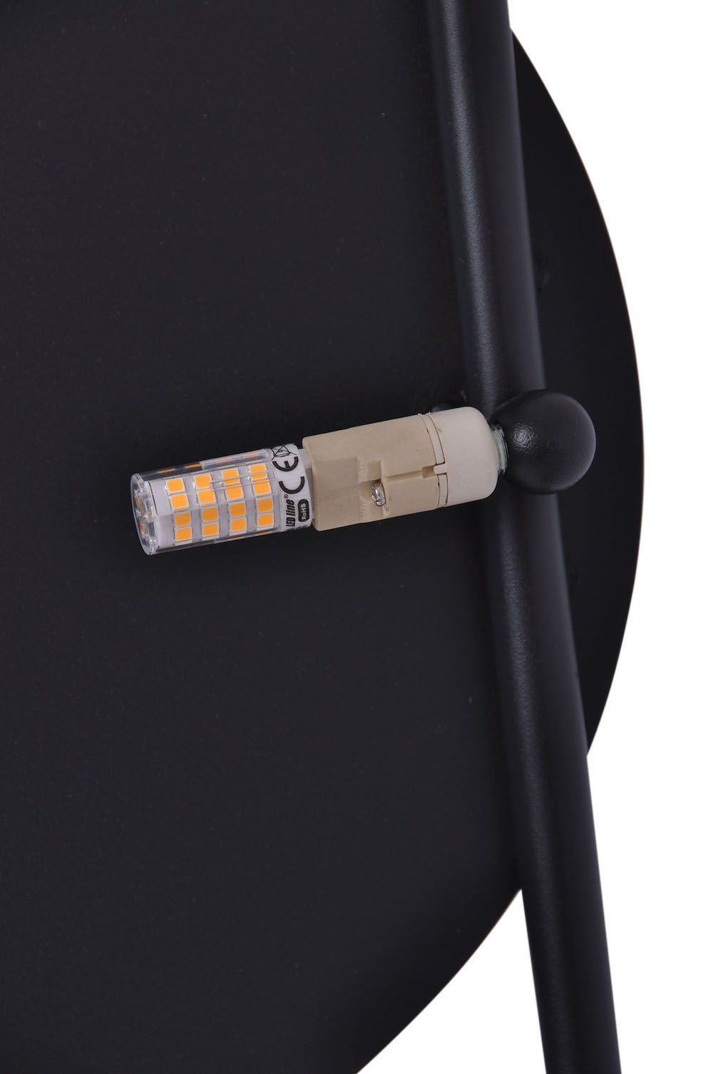 Stylowy kinkiet Rega z trzema czarnymi okręgami