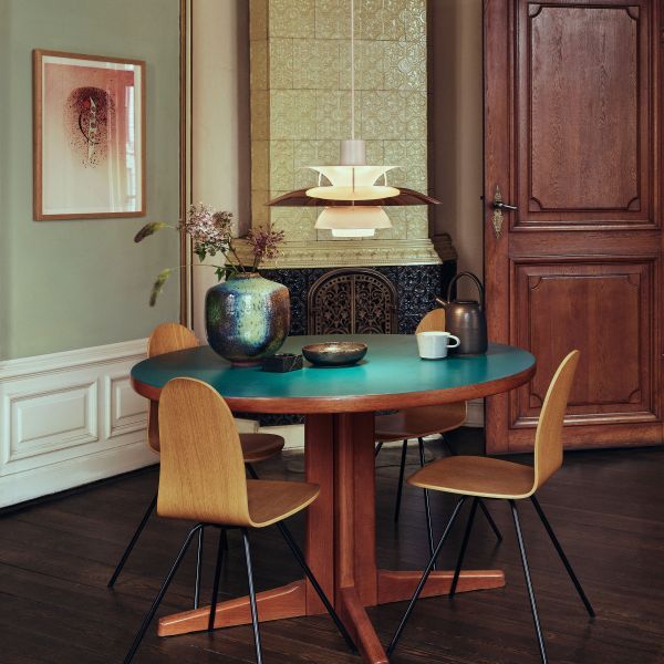 Wisząca lampa PH 5 Mini marki Louis Poulsen w kolorze mosiądzu