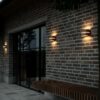 Brązowy metaliczny kinkiet zewnętrzny Sibelis o klasie szczelności IP44