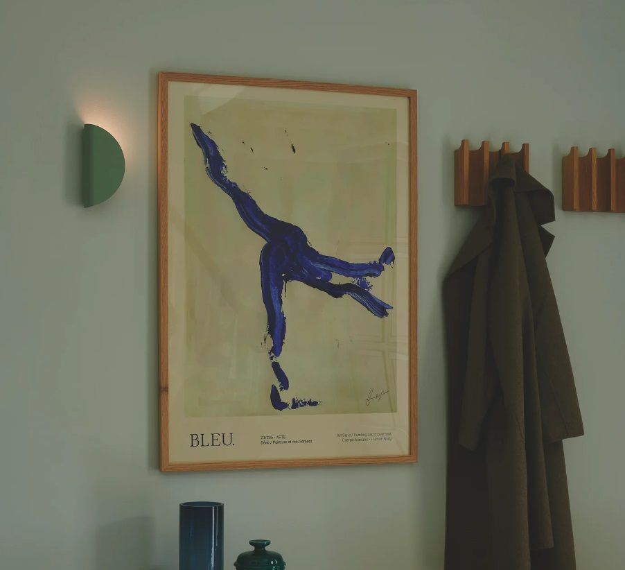 Zielony kinkiet Model 2110 Nordlux o zakrzywionej formie przypominającej taco