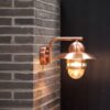 Miedziana lampa ścienna Nibe do użytku zewnętrznego od Nordlux, odporna na warunki atmosferyczne (IP54)
