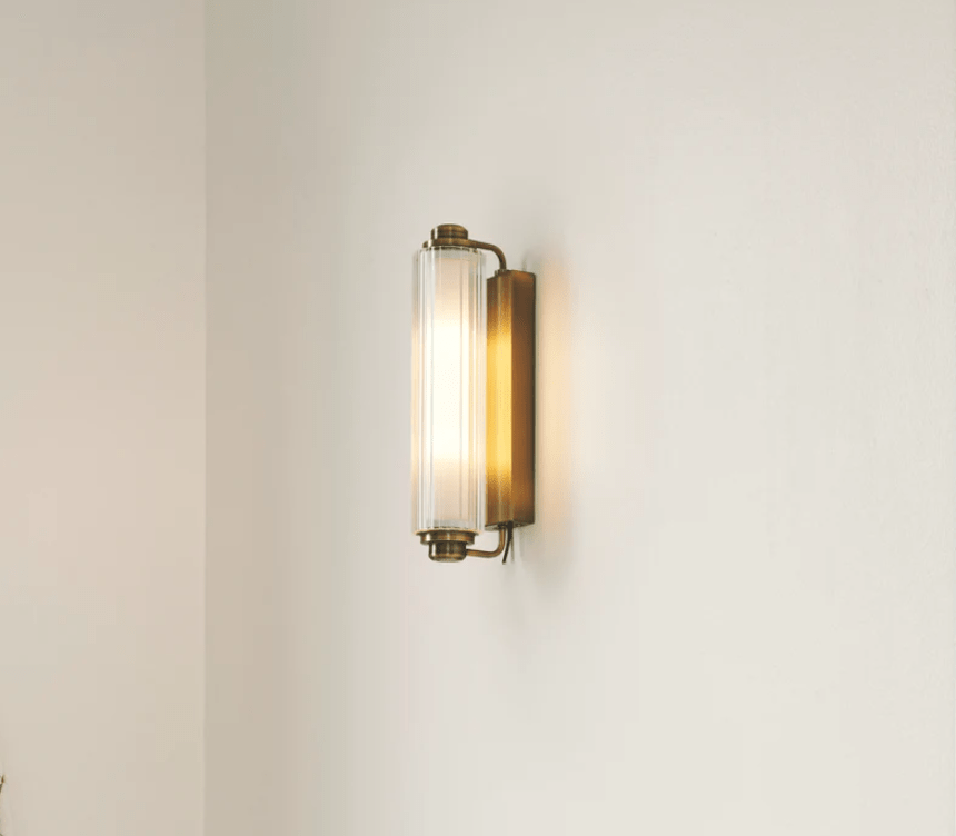 Złoty kinkiet Nimal od Nordlux ze żłobionym kloszem