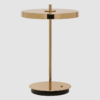 Przenośna lampa stołowa Asteria Move V2 w złotym kolorze, ładowana przez USB