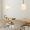 Złoto-biała wisząca lampa Around The World o średnicy 35 cm w odcieniu mosiądzu