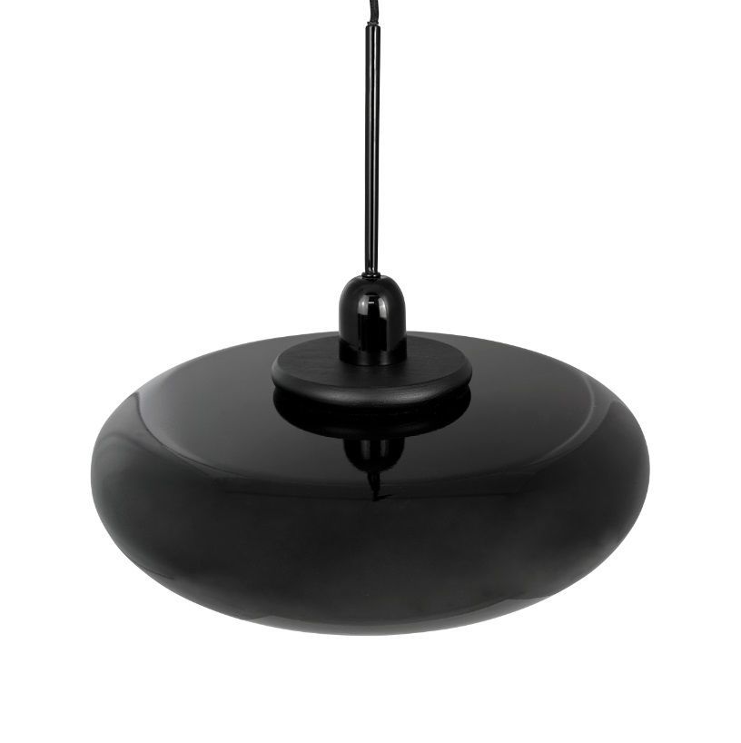 Czarna wisząca lampa nad stolikiem Planet marki Dyberg Larsen