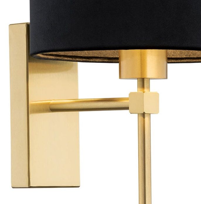 Elegancki kinkiet Abbano z mosiądzu w czarno-złotym wykończeniu, wyróżniający się stylowym designem