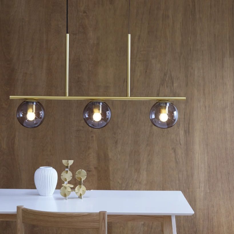 Trzypunktowa, podłużna lampa wisząca Sophia wykonana z mosiądzu