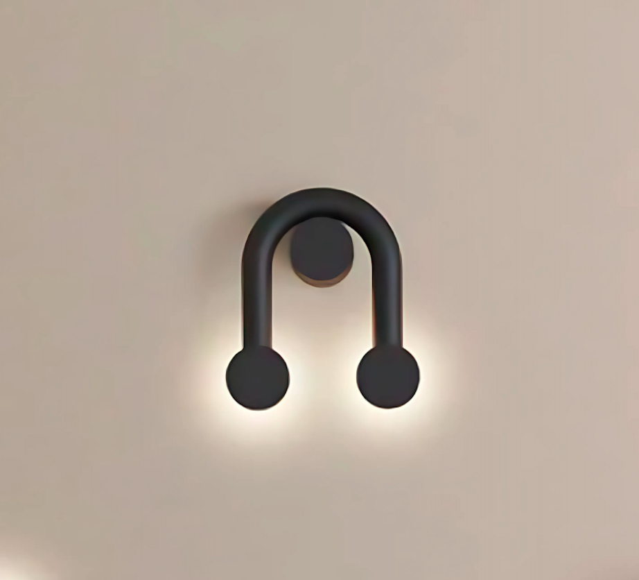 Nowoczesny, czarny kinkiet LED Rigoberta o zakrzywionym kształcie