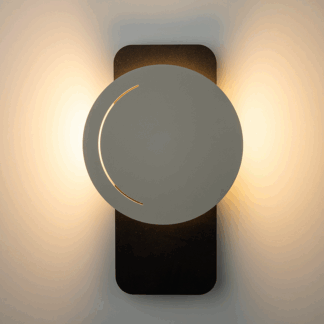 Kinkiet MoonLight w czarno-szarych odcieniach z dekoracyjnym efektem światła odbitego