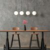 Wisząca lampa Martin 4 z białymi kloszami nad stół