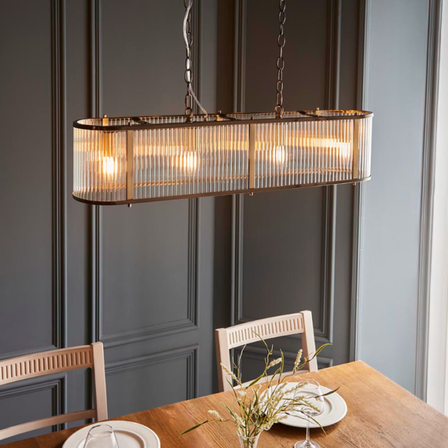 Podłużna lampa wisząca Ridgeton 90 w stylu art deco nad stół