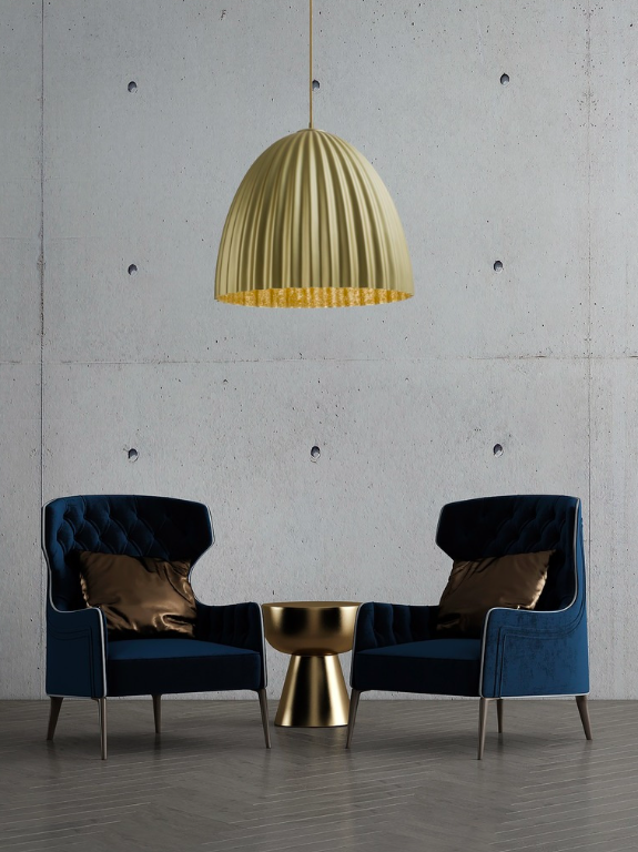 Duża złota lampa wisząca Faselia o falistej kopule