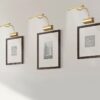 Złota lampa Curtis z regulowanym kloszem nad obraz