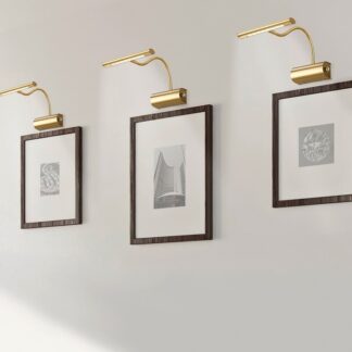 Złota lampa Curtis z regulowanym kloszem nad obraz