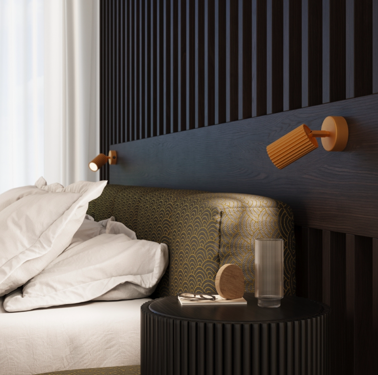 Ruchomy kinkiet Karbon w złotym kolorze do nowoczesnego salonu