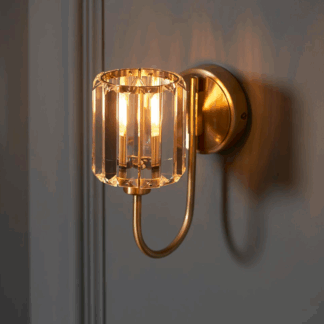 Złoty kinkiet w stylu art deco Berenice w odcieniu antycznego mosiądzu