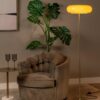 Stylowa lampa stojąca Sentino z beżowym szklanym kloszem w kształcie torusa