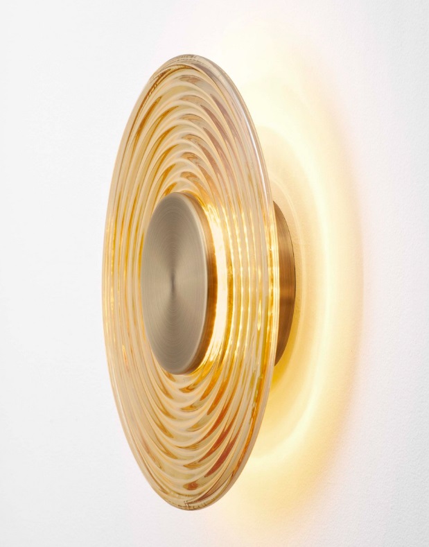 Kinkiet Calbelle w złotym, okrągłym kształcie z elementami art déco