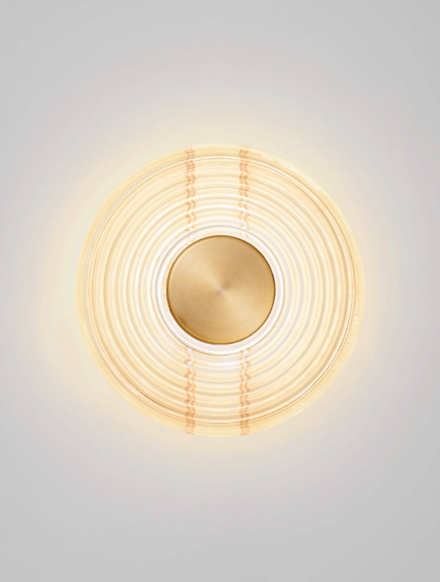 Kinkiet Calbelle w złotym, okrągłym kształcie z elementami art déco