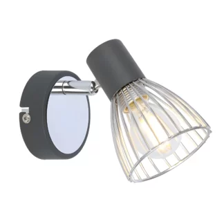 Kinkiet Modo obok kanapy w salonie