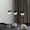 Lampa wisząca Contina nad długi stół w jadalni