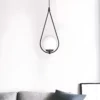 Lampa wisząca kula Neve - w stalowej ramie do salonu