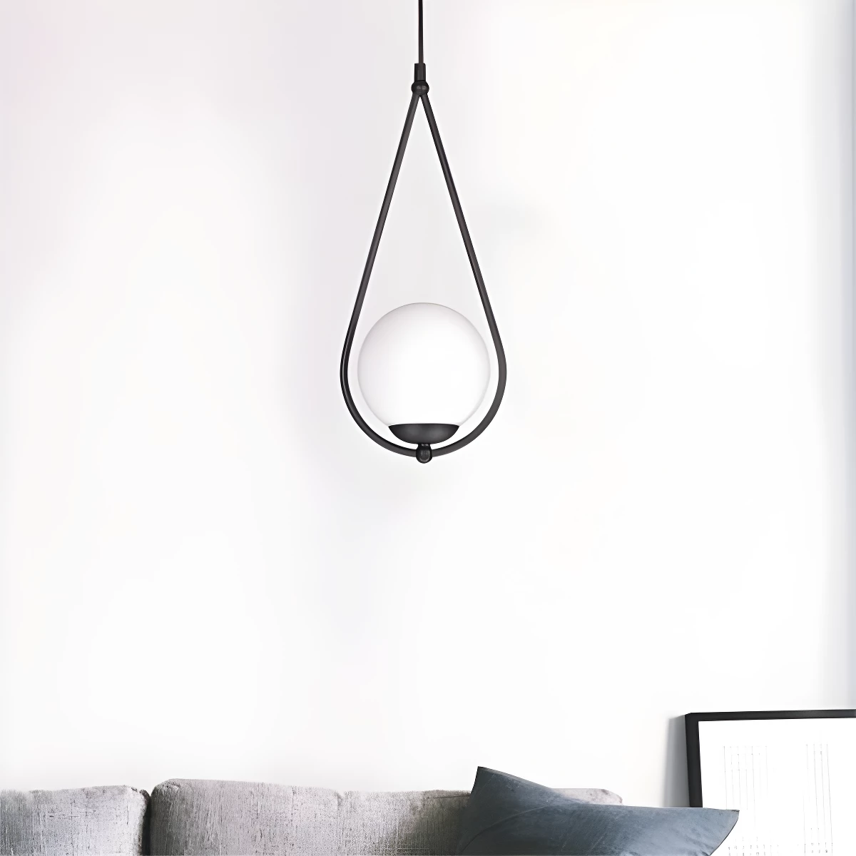 Lampa wisząca kula Neve - w stalowej ramie do salonu