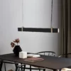 Lampa wisząca Lilt nad długi stół w jadalni