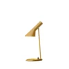 Żółta nowoczesna lampa stołowa AJ Mini od Louis Poulsen