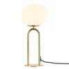 Lampa stołowa Shapes od DFTP ze złotą bazą i asymetrycznym kloszem