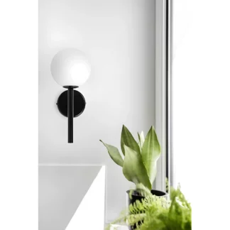 Kinkiet Kop A jako doświetlenie lustra w garderobie