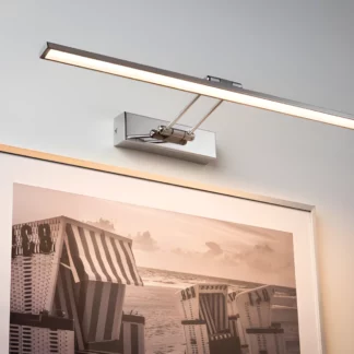 Kinkiet Beam Sixty nad obraz w salonie