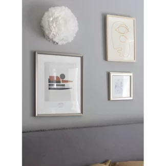 Kinkiet Eos Up S do nowoczesnego salonu